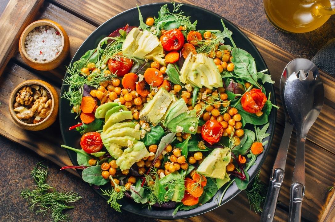 high choline nourish bowl with chickpeas, avocado, rocket, tomato