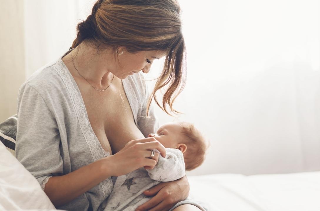 woman breastfeeding baby on a plant-based diet